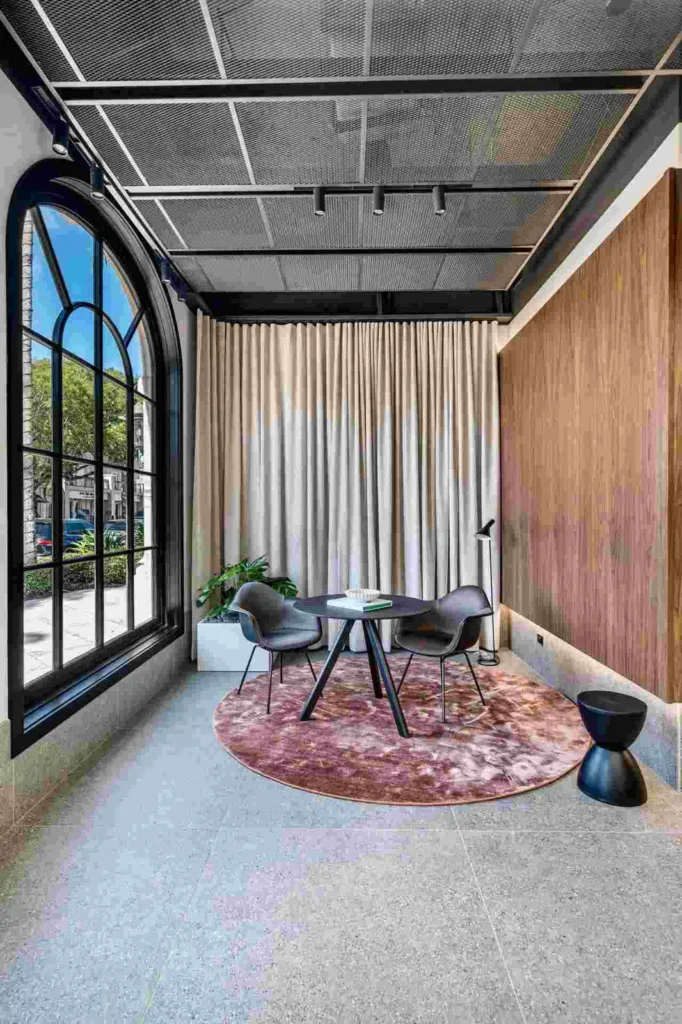 2 chairs seating area inside Porsche Studio Naples