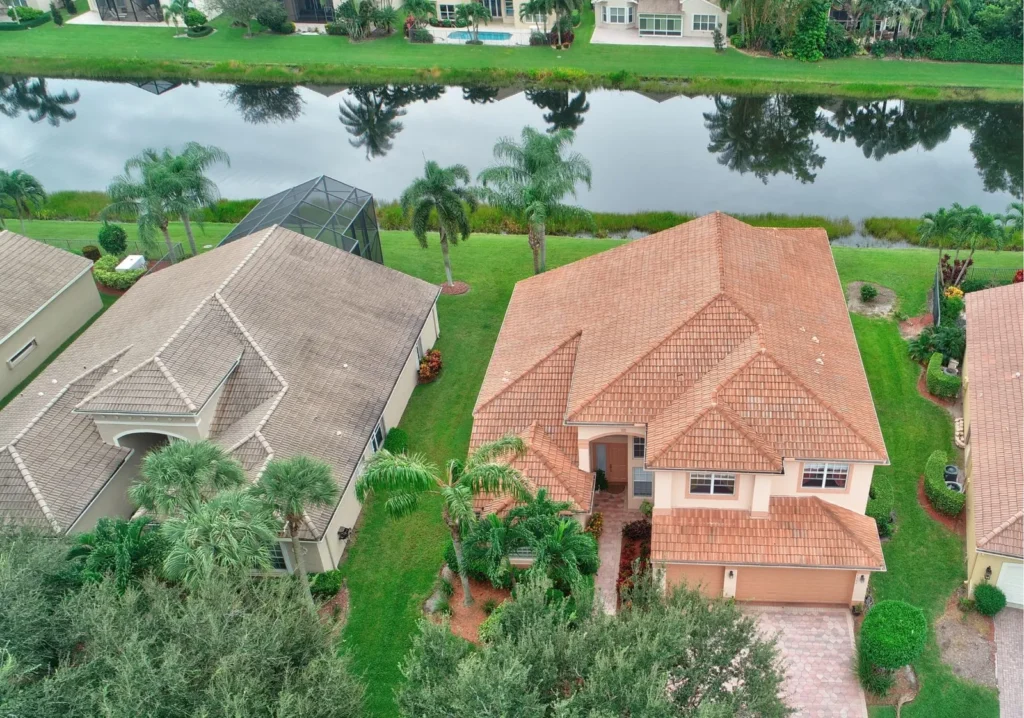 Arial view of 2 homes on a canal