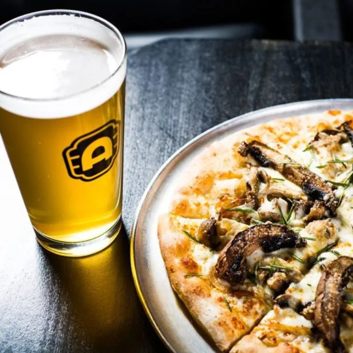 Beer and mushroom pizza at Alamo Drafthouse