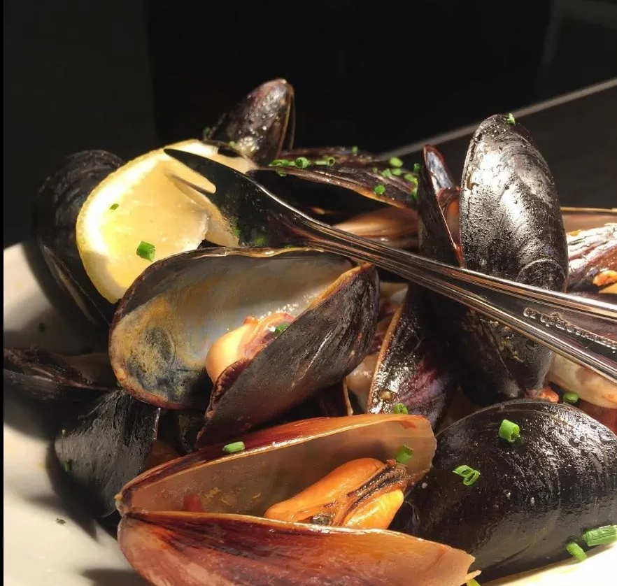 Bowl of steamed mussels at Paella's
