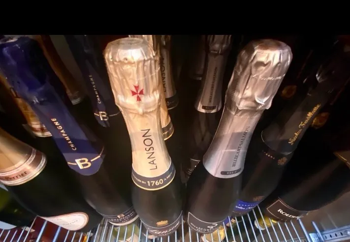 Champagne bottles chilling at Three60 Wine at Logan Landings