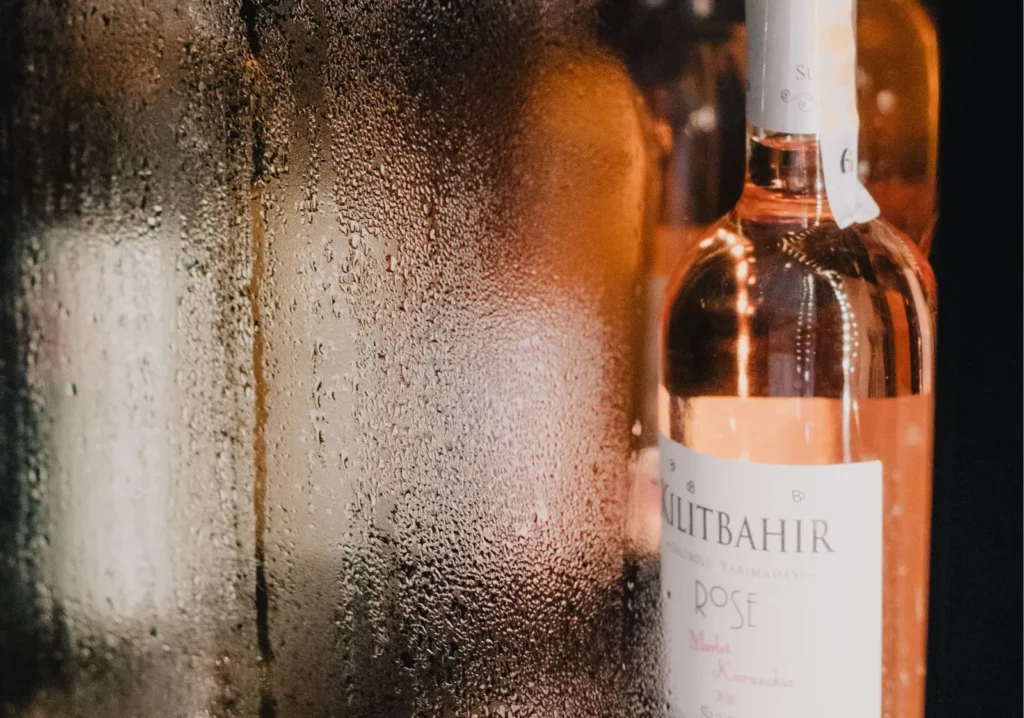 Chilled bottle of rose wine