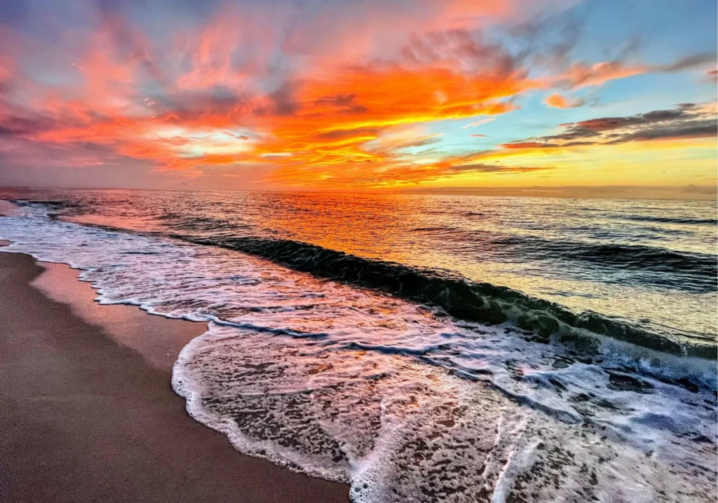 Close up view of sunset on a beach shore line