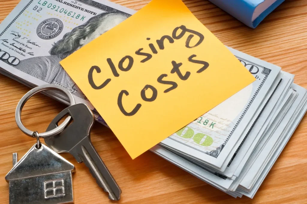 Closing costs note with cash and house keys