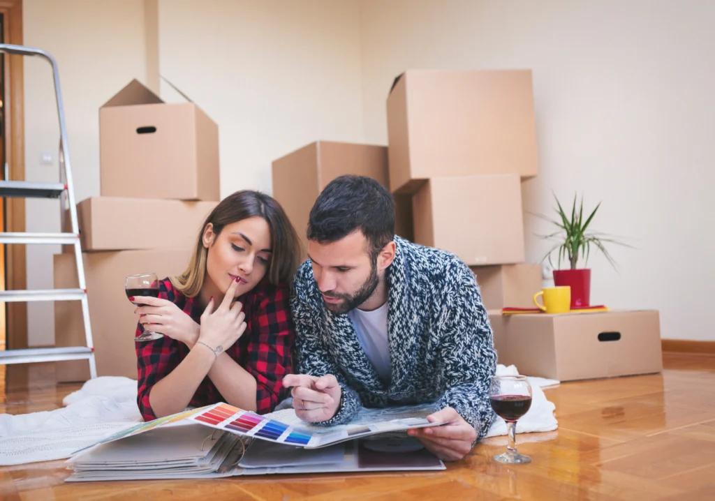 Couple and house move boxes