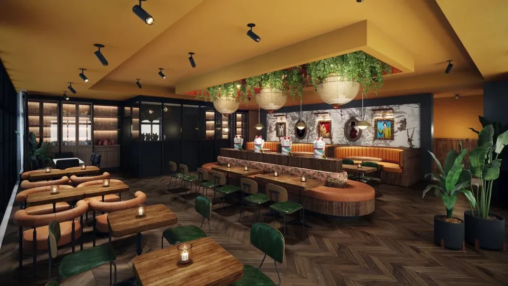 Dining room with green banquettes at Tigress Restaurant