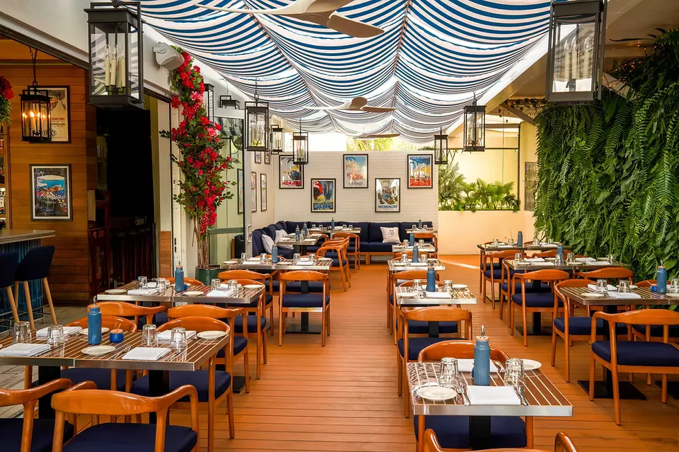 Dining room with striped canopy ceiling at La Saliere