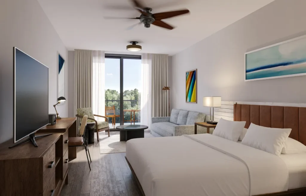 Guest room with king bed at The Perry Hotel Naples