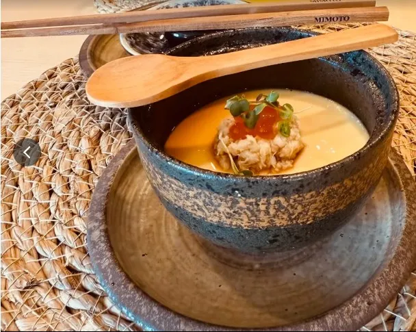 Japanese seafood soup in a ceramic bowl at Mimoto