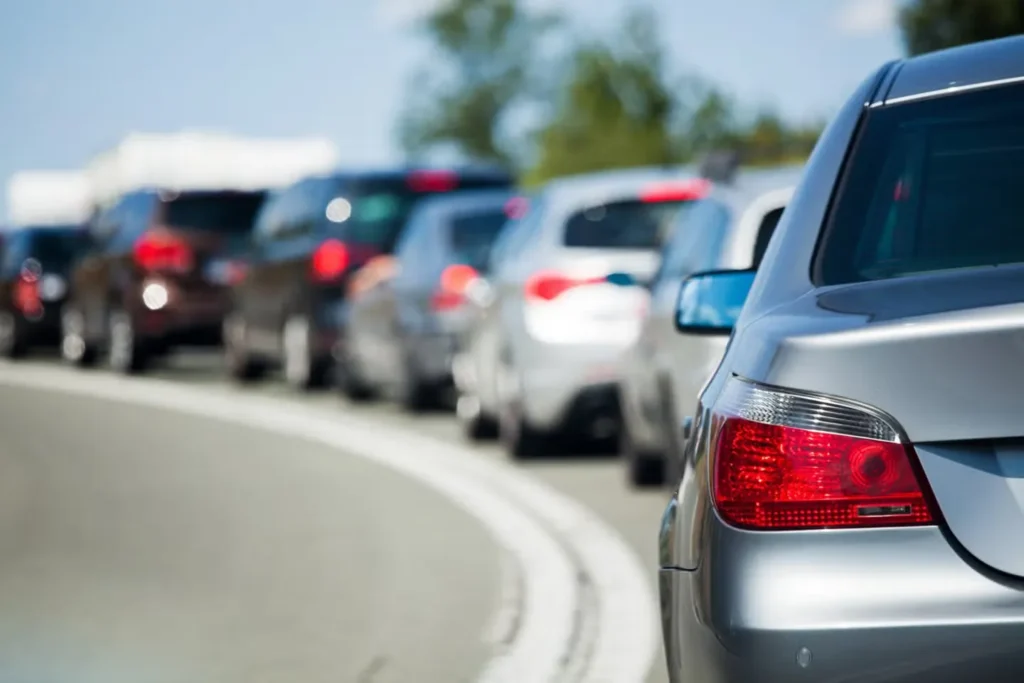 Line of cars in seasonal traffic on a Naples road
