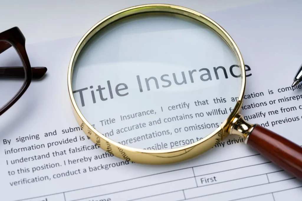 Magnifying glass over a title insurance document