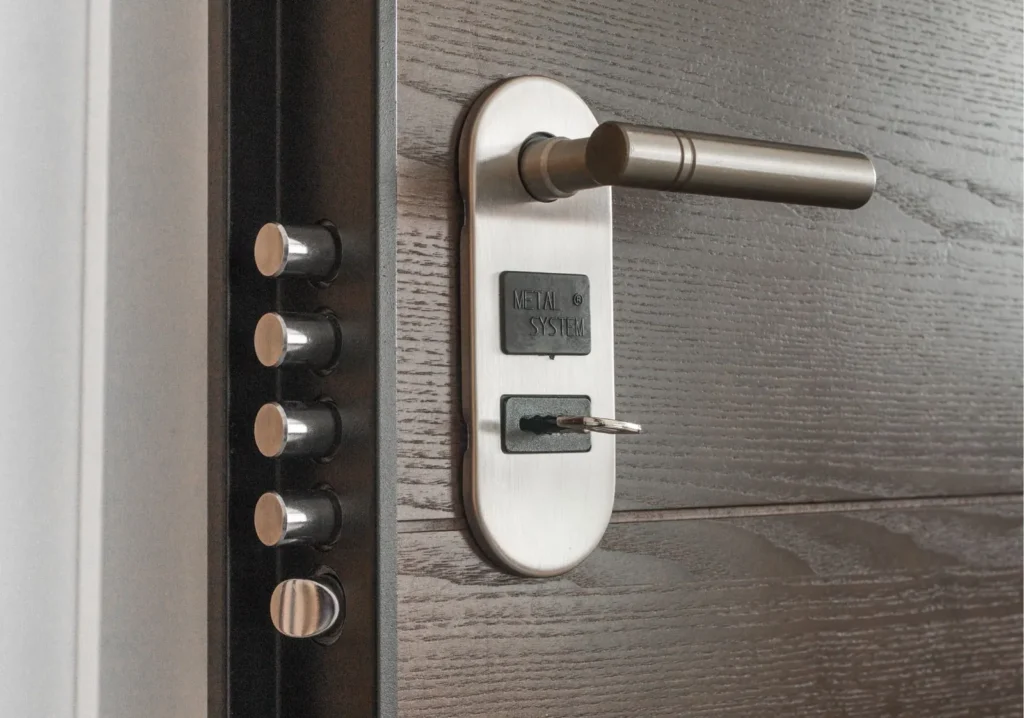 Modern wood front door showing sophisticated locking mechanism