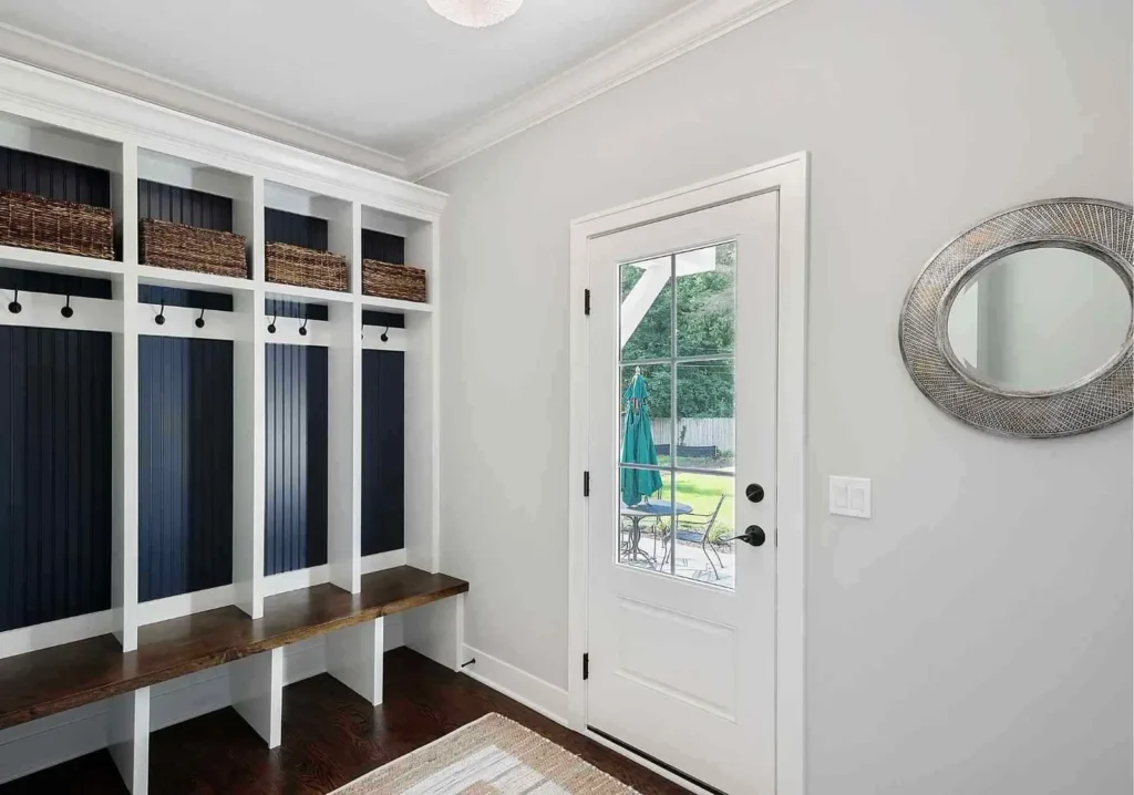 Mudroom organized with stall spaces