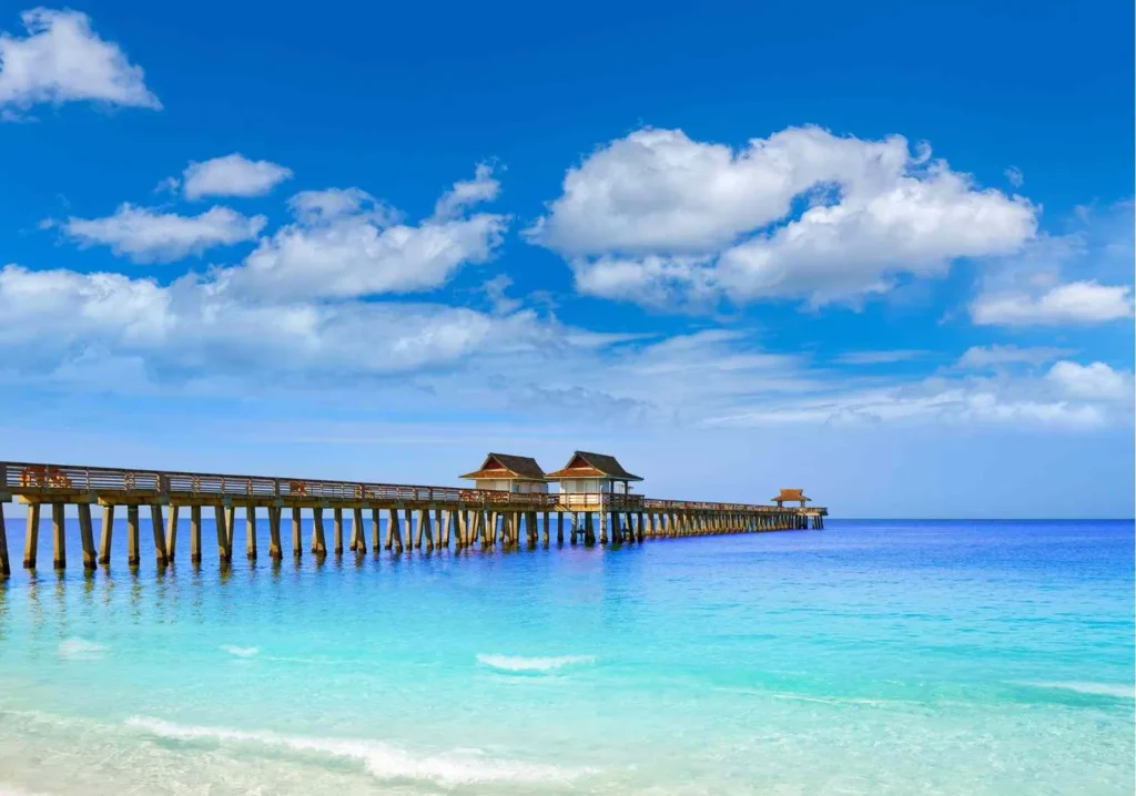 Naples Pier and turquoise gulf on a sunny day