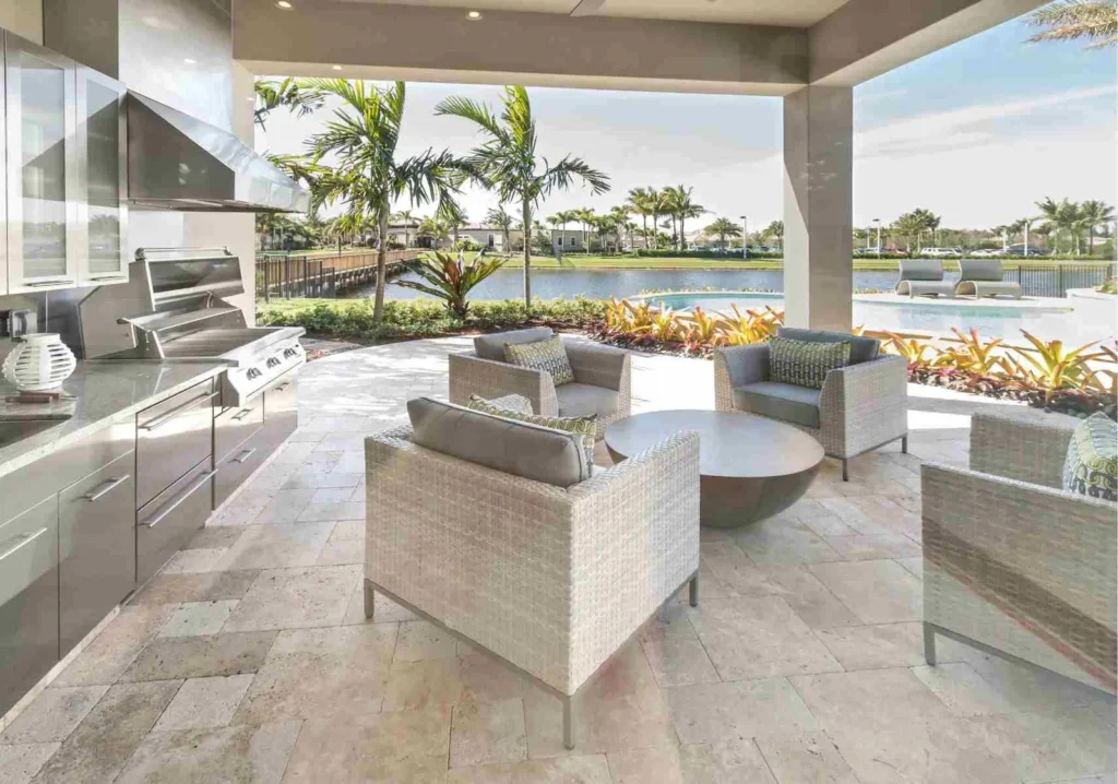 Neutral outdoor living space overlooking a community lake