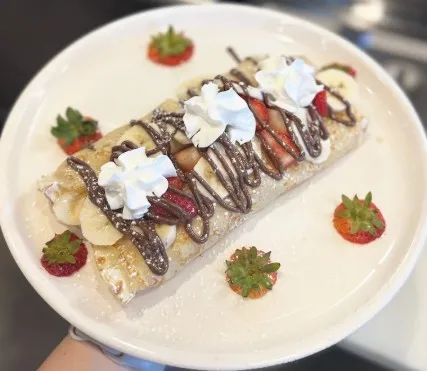 Nutella crepe with strawberries and whipped cream at Sunny House Cafe