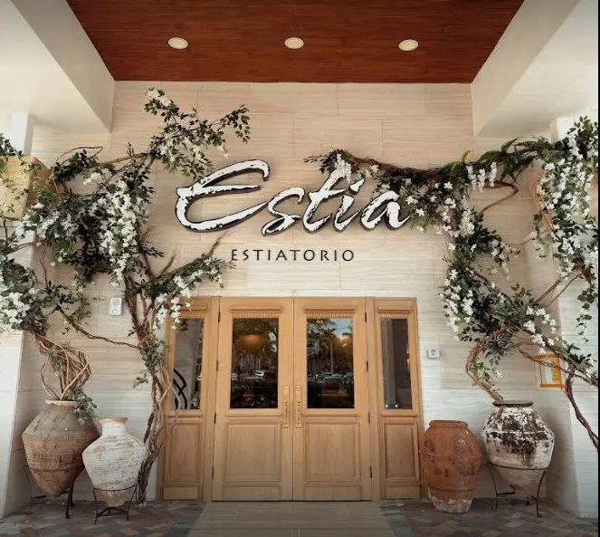Outside of Estia restaurant front with sign