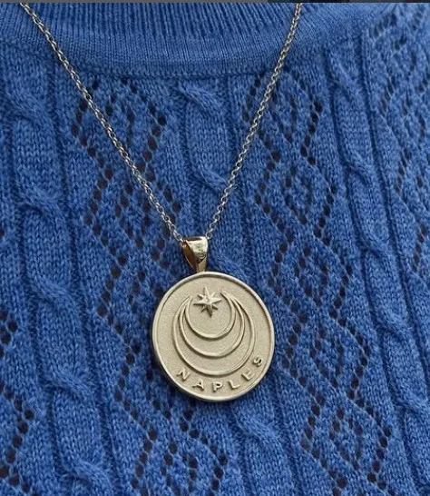 Perch neck medallion