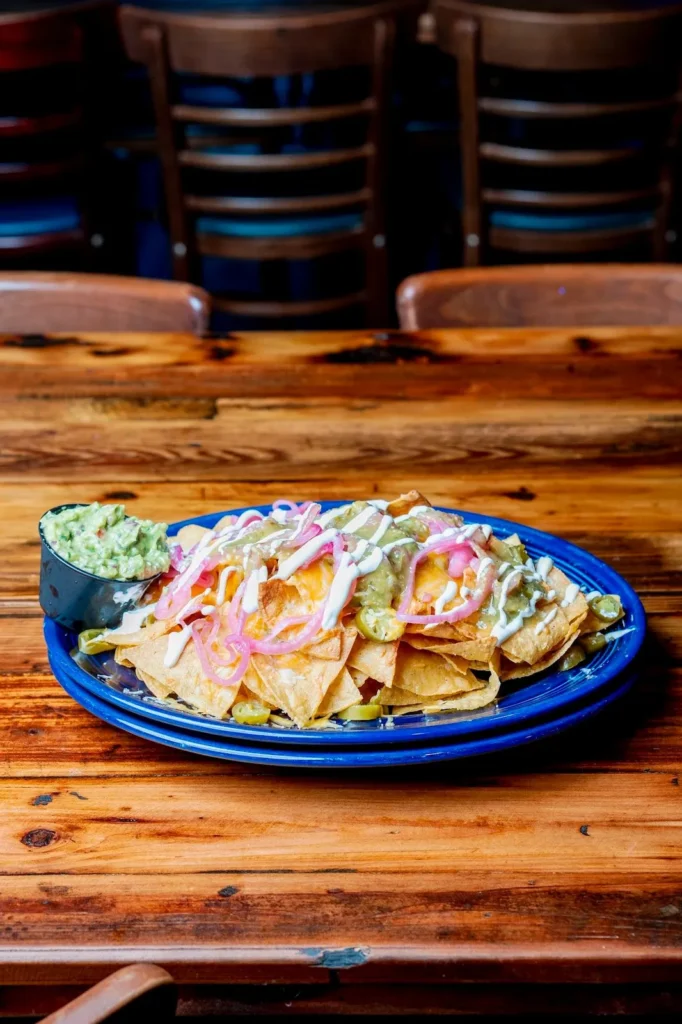 Plate of loaded nachos at Old Town Saloon