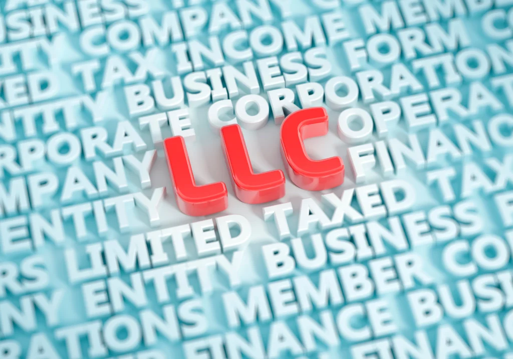 Red LLC letters surrounded by business entity and tax words