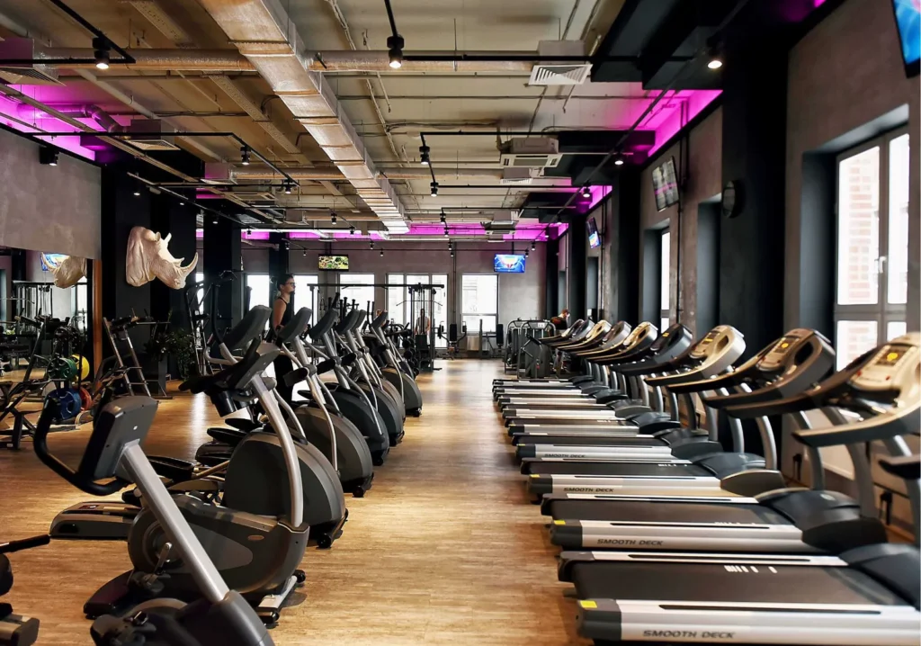 Rows of treadmills at a fitness center