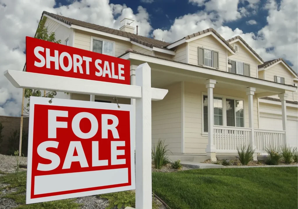Short Sale for sale sign outside a home