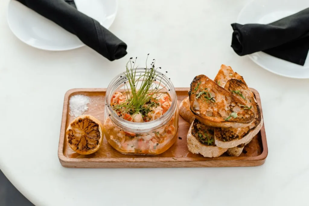Shrimp cocktail and toast board at The Bohemian