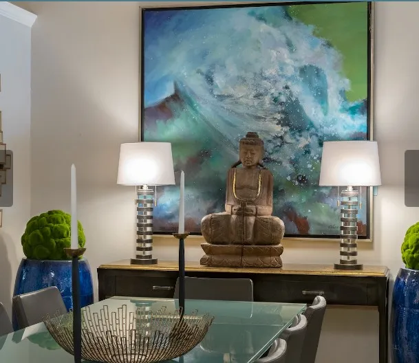 Side table scene with buddha and 2 side lamps