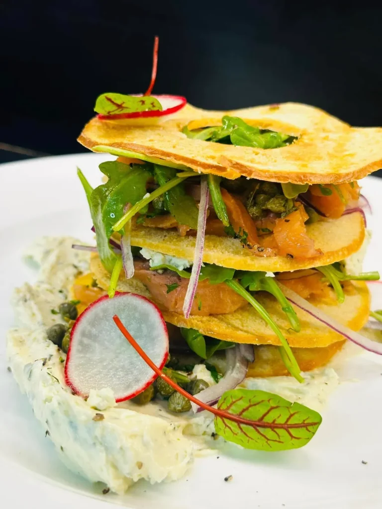 Stacked plated appetizer at Soluna Restaurant