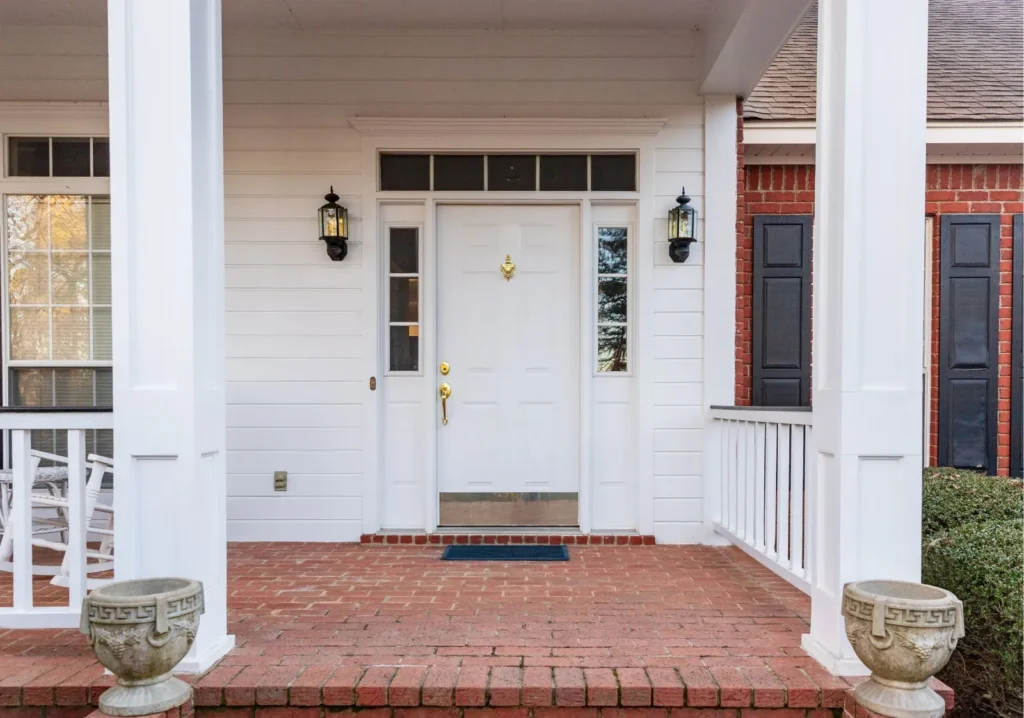 Traditional home with white front door
