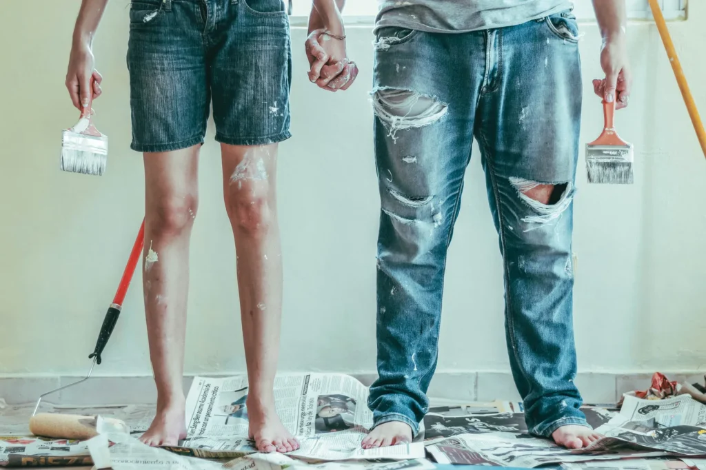 Two people doing home renovations