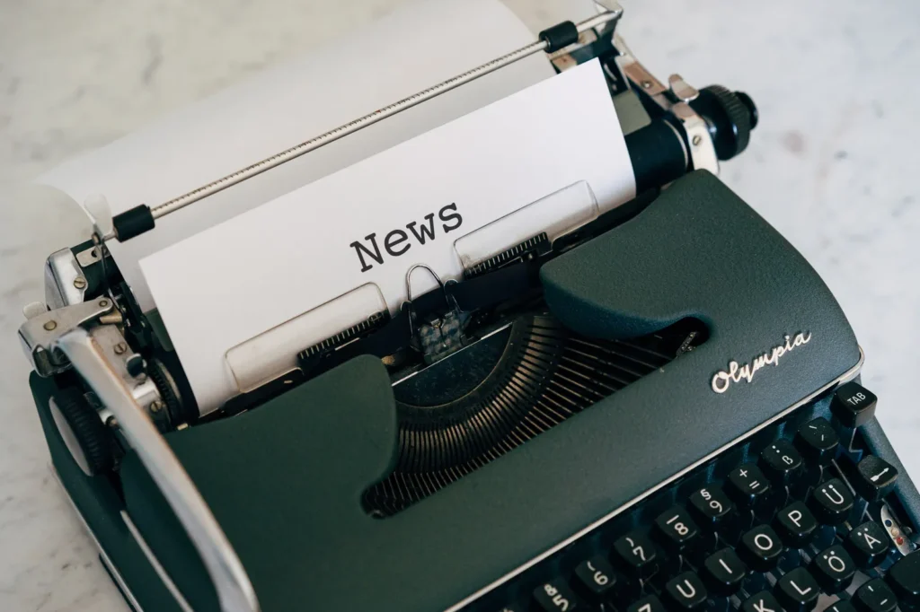 Typewriter typing a news page