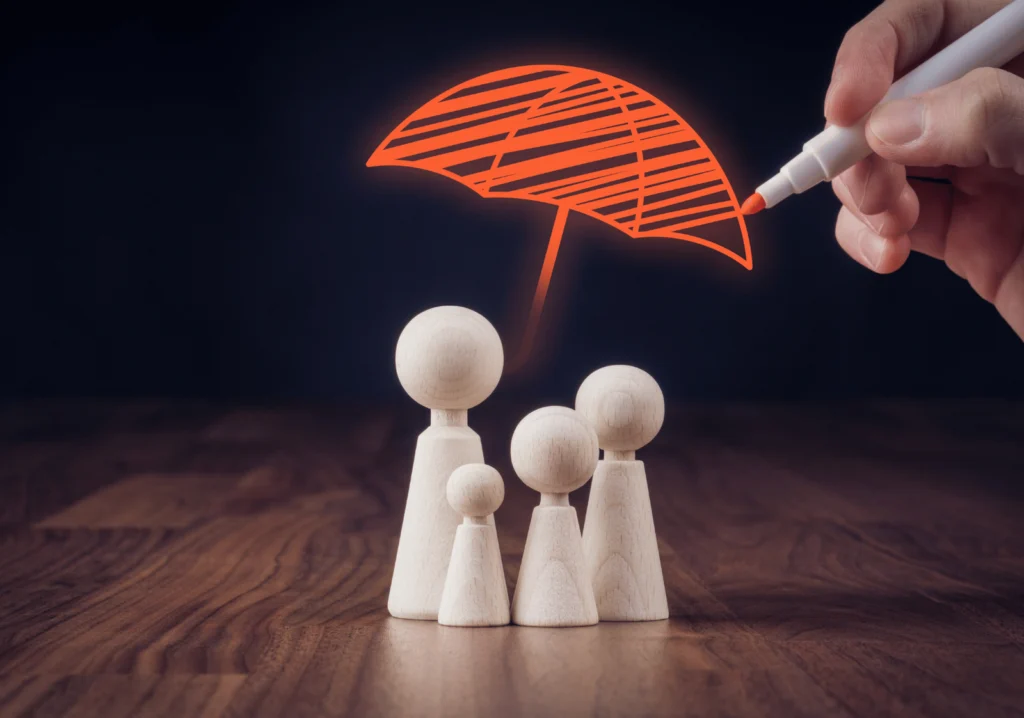 Umbrella covering human figures