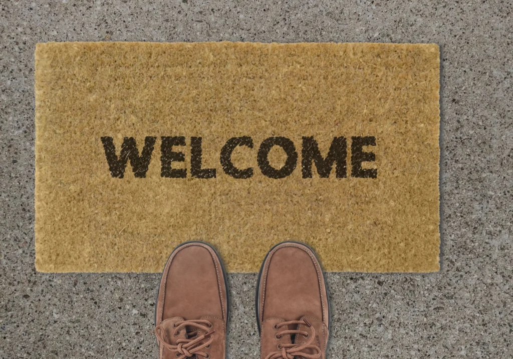 Welcome mat at the front door of a new home