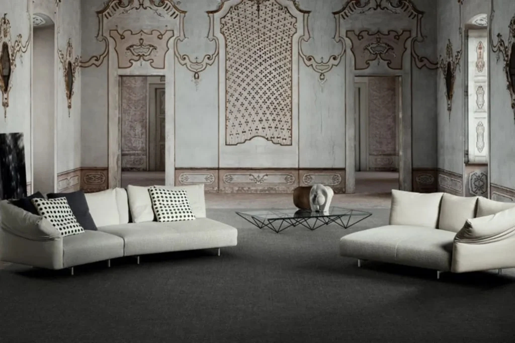 White B&B Italia sofas in an ornate gallery room